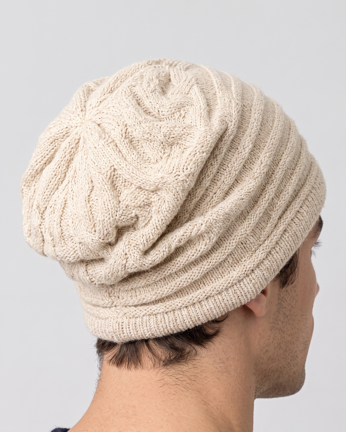 Men's Cashmere Slouchy Beanie — Apricot — construction detail [WB final 4:5 1]