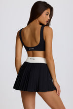 Women's Soft Active Crossover Pleated Mini Skort in Black — Skirt