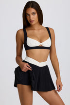 Women's Soft Active Crossover Pleated Mini Skort in Black — Skirt