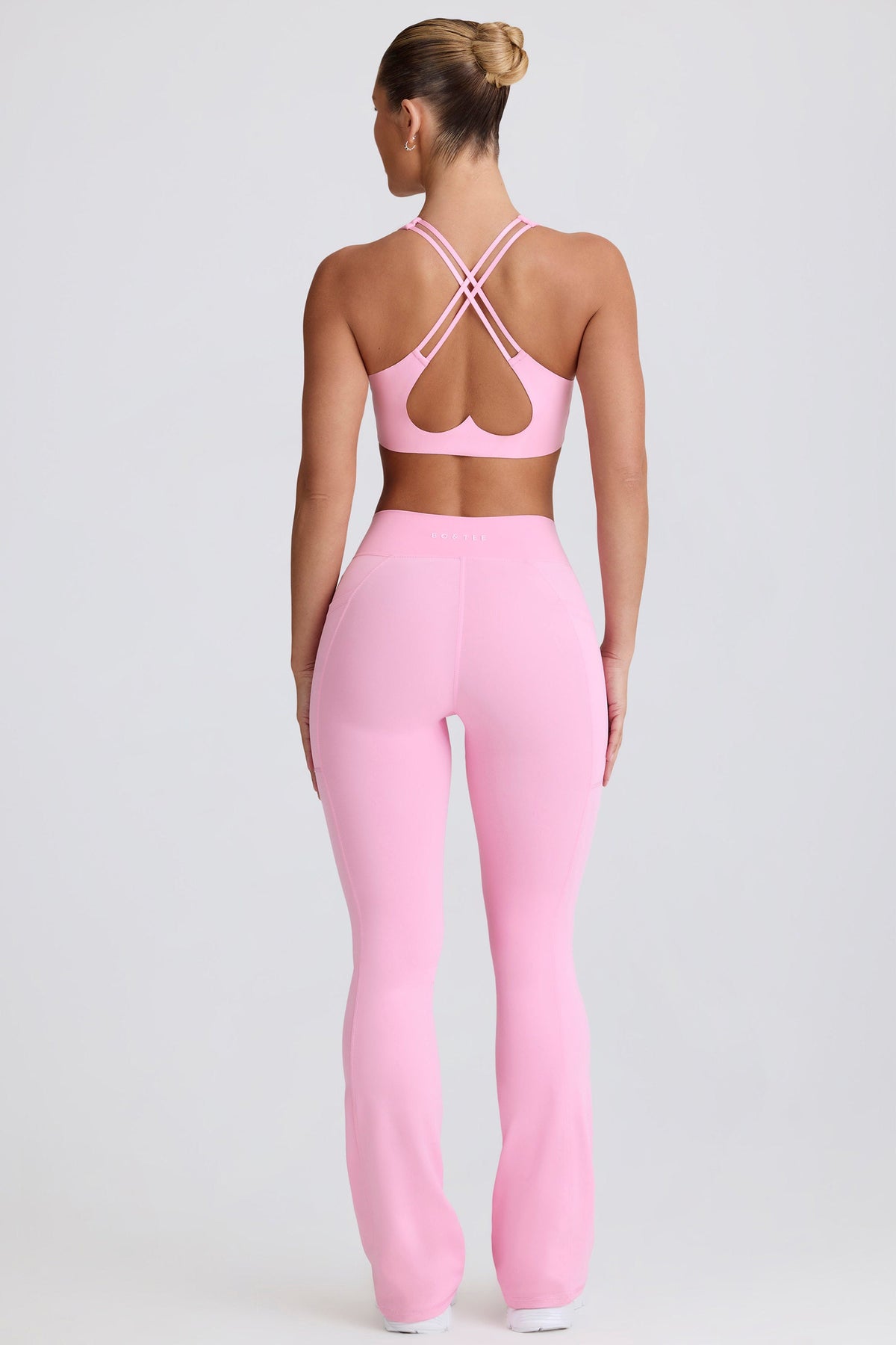 Women's Soft Active V-Waist Pocket Flared Leggings in Baby Pink — Activewear
