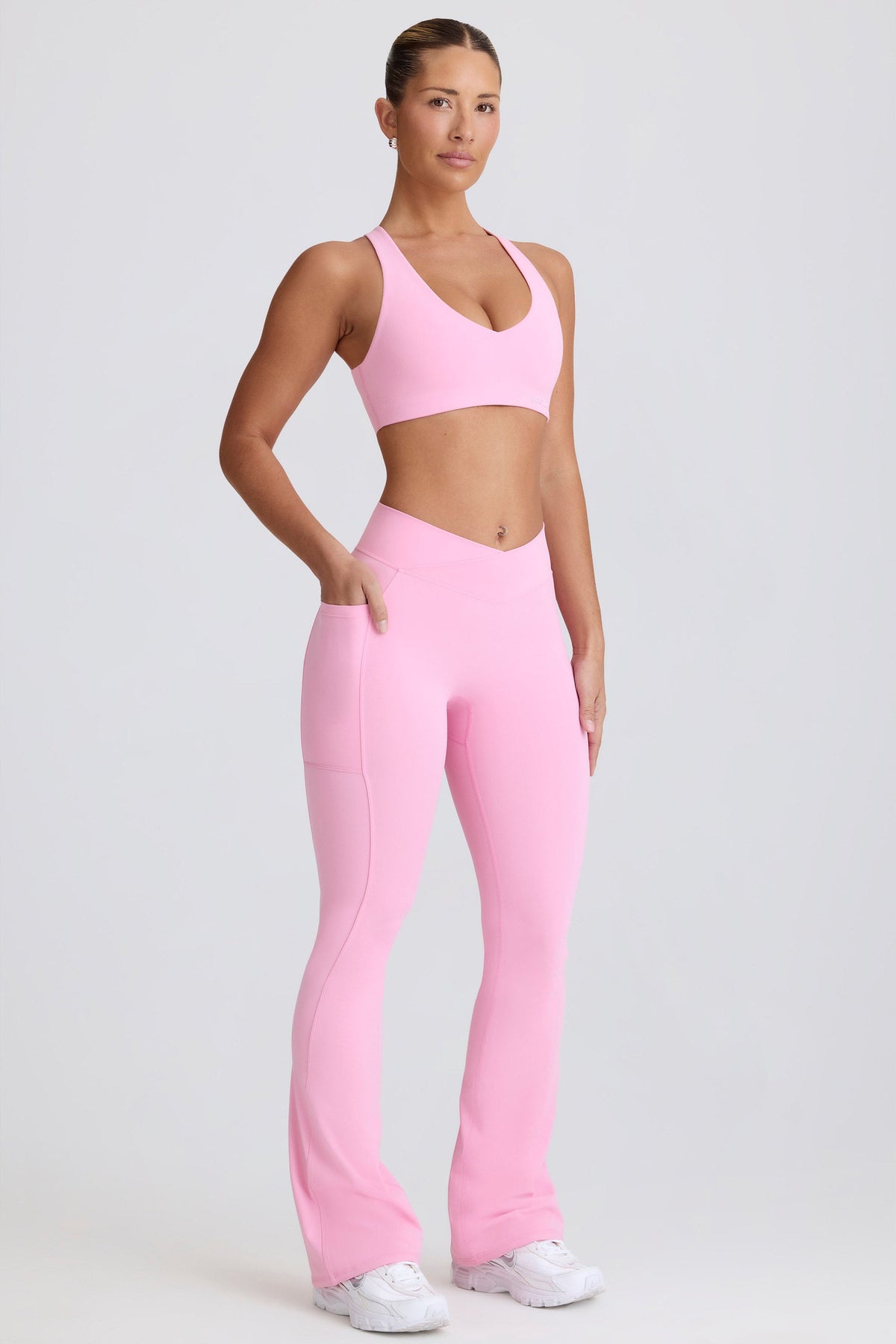 Women's Soft Active V-Waist Pocket Flared Leggings in Baby Pink — Activewear
