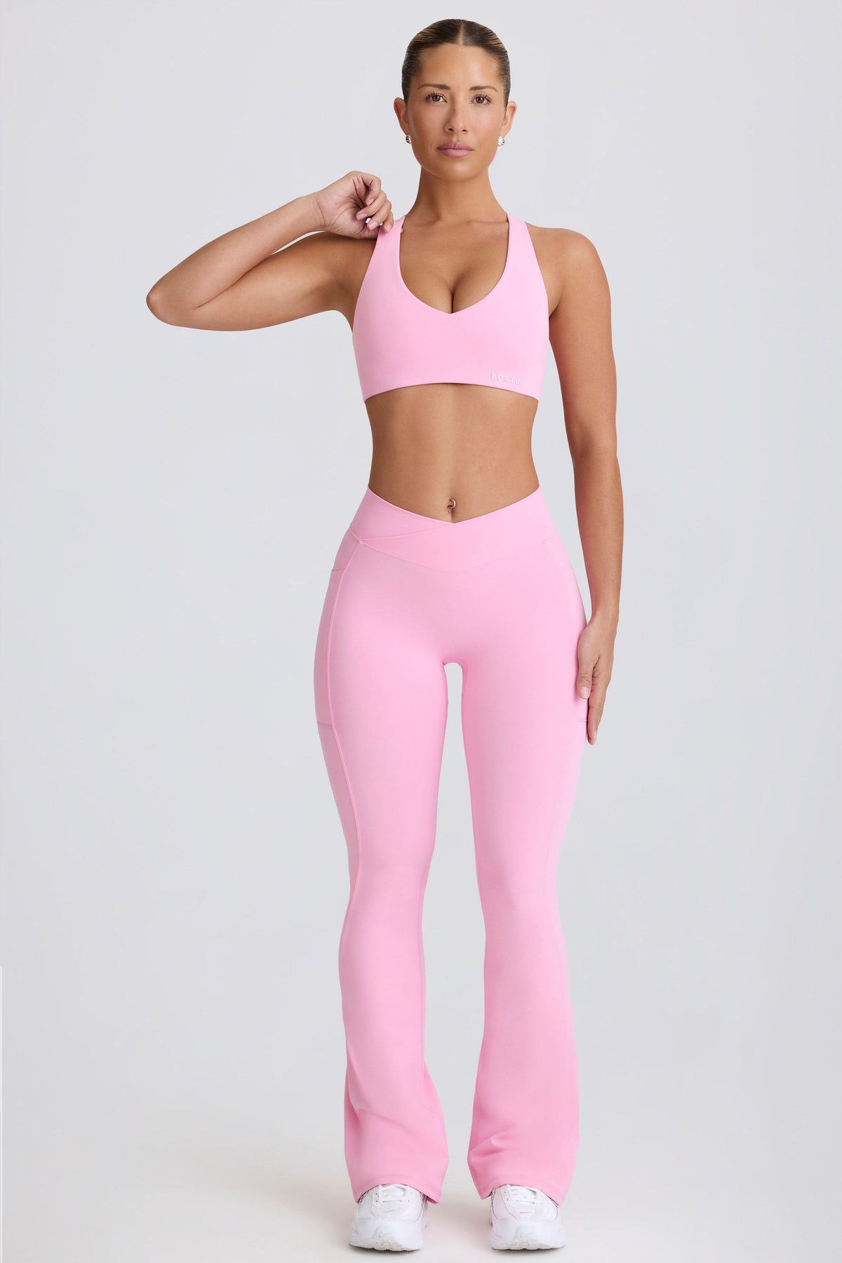 Women's Soft Active V-Waist Pocket Flared Leggings in Baby Pink — Activewear