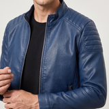 Men's blue faux leather biker jacket with quilted shoulders, collar and shoulder detail