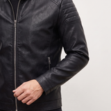 Men's black faux leather biker jacket with quilted shoulders, cuff and side pocket detail