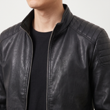 Men's black faux leather biker jacket with quilted shoulders, collar and shoulder detail