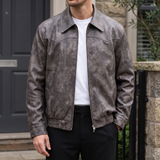 Men's distressed gray-brown faux leather jacket, front lifestyle view