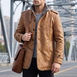 Men's khaki faux leather coat, lifestyle view with shoulder bag