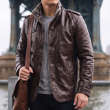 Men's brown faux leather coat, lifestyle view with shoulder bag