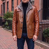 Men's reddish brown faux leather coat, street lifestyle view