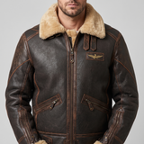 Men's brown faux leather aviator jacket with plush trim, collar detail
