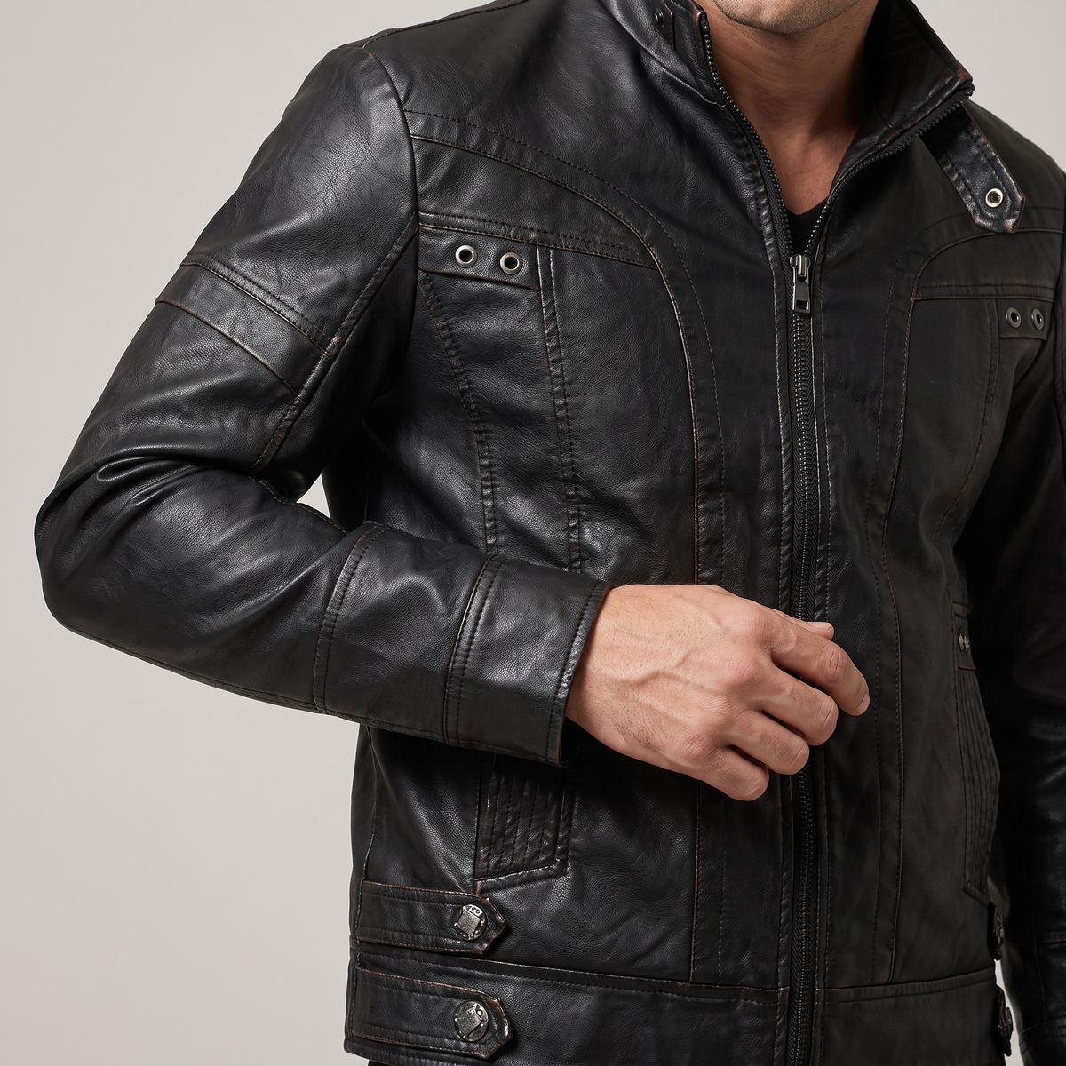 Men's black faux leather jacket with eyelet details, cuff and hem detail