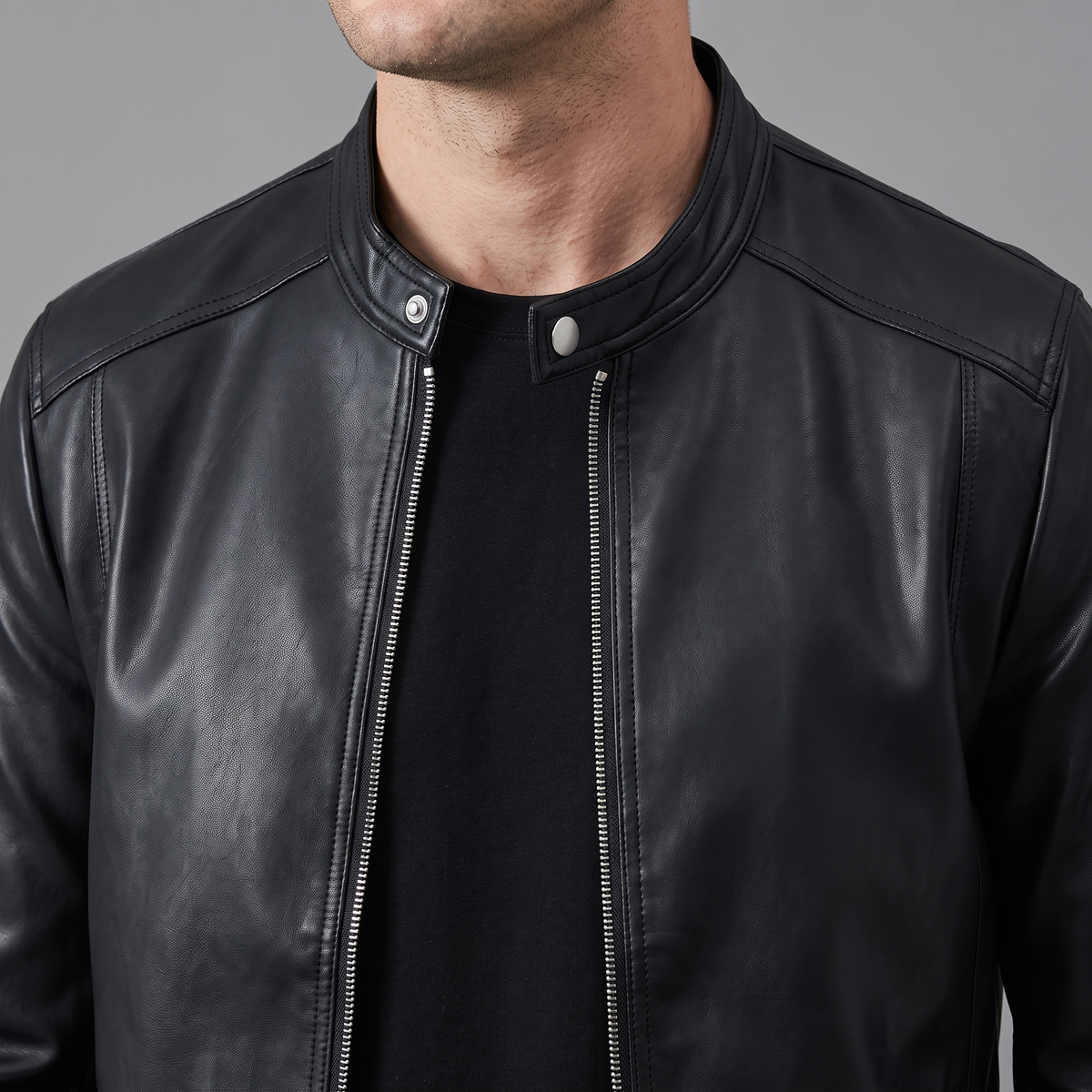 Men's black minimalist faux leather racer jacket, collar detail