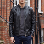 Men's black minimalist faux leather racer jacket, street lifestyle view