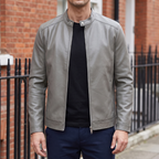 Men's gray minimalist faux leather racer jacket, street lifestyle view