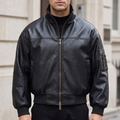 Men's black textured faux leather bomber jacket, front lifestyle view