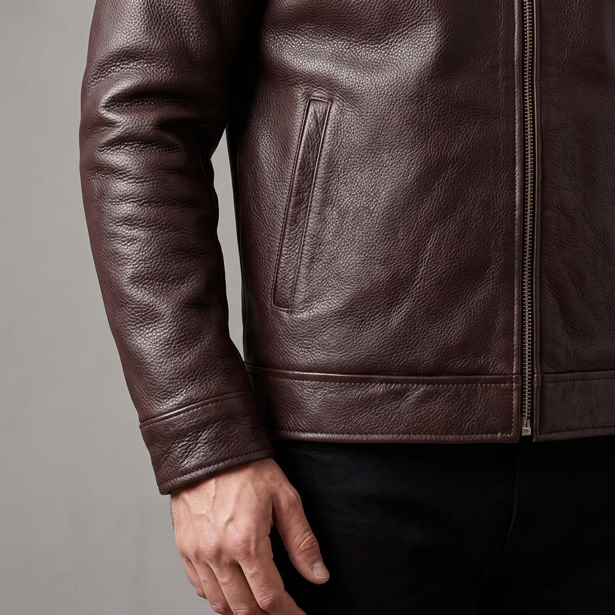 Men's dark brown cowhide leather zip jacket, cuff and welt pocket detail