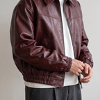 Men's wine red relaxed faux leather bomber jacket, gathered cuff detail