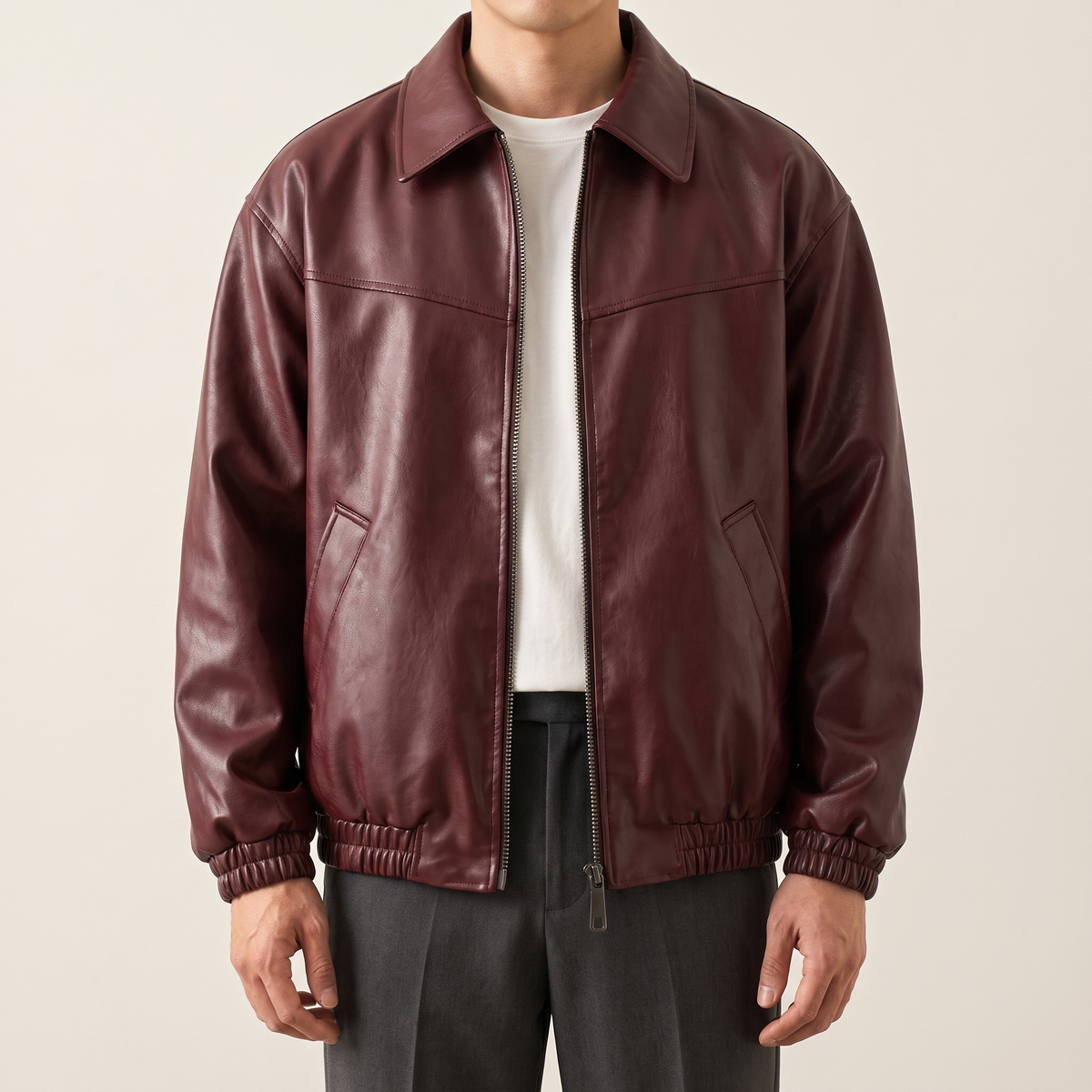 Men's wine red relaxed faux leather bomber jacket, studio front view