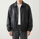 Men's black oversized faux leather jacket, studio front view