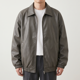 Men's grey oversized faux leather jacket, studio front view