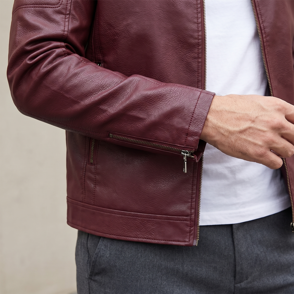 Men's Slim Faux Leather Racer Jacket with Stitched Shoulders in Burgundy — zip cuff detail