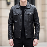 Men's black slim faux leather trucker jacket, front lifestyle view