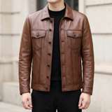 Men's brown cowhide leather trucker jacket, front lifestyle view