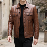 Men's brown cowhide leather trucker jacket, walking lifestyle view
