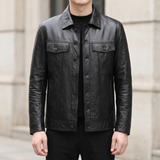Men's black cowhide leather trucker jacket, front lifestyle view