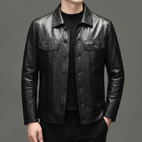 Men's black cowhide leather trucker jacket, studio view