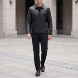 Men's black goatskin leather jacket, full-body lifestyle view