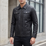 Men's black faux leather trucker jacket, three-quarter lifestyle