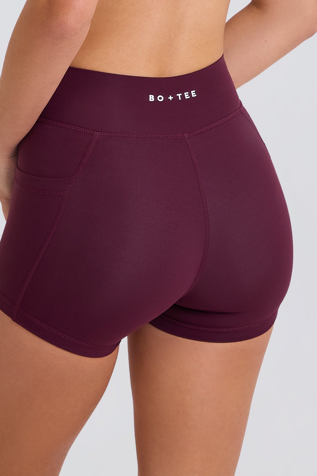 Women's Soft Active V-Waist Pocket Mini Shorts in Burgundy