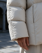 Women's loose-fit hooded puffer jacket
