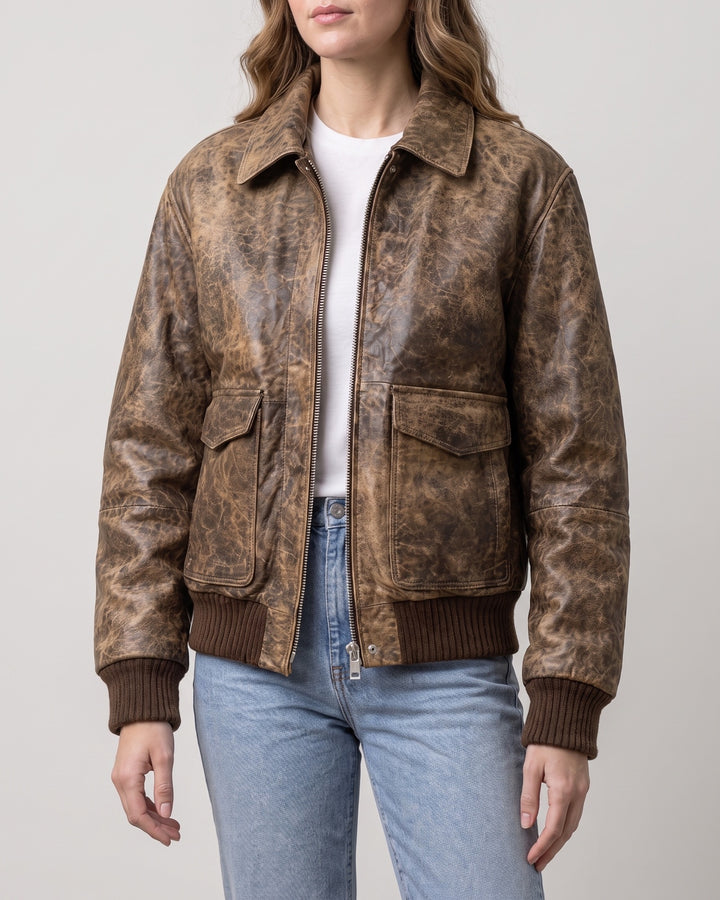 Women's Cassidy Oversized Leather Bomber Jacket — Brown on light gray background