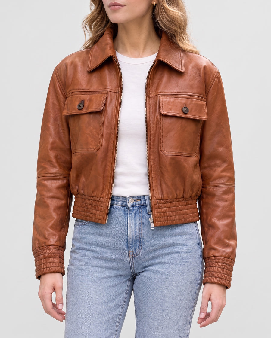 Women's Maggie Cropped Lightweight Leather Aviator Jacket — Cognac on light gray background