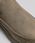 Khaki slip-on shoe textile and seam detail