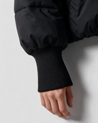 Black quilted jacket ribbed cuff detail