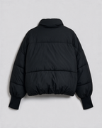 Black quilted jacket rear view