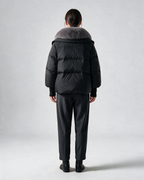 Black padded jacket, full rear view.