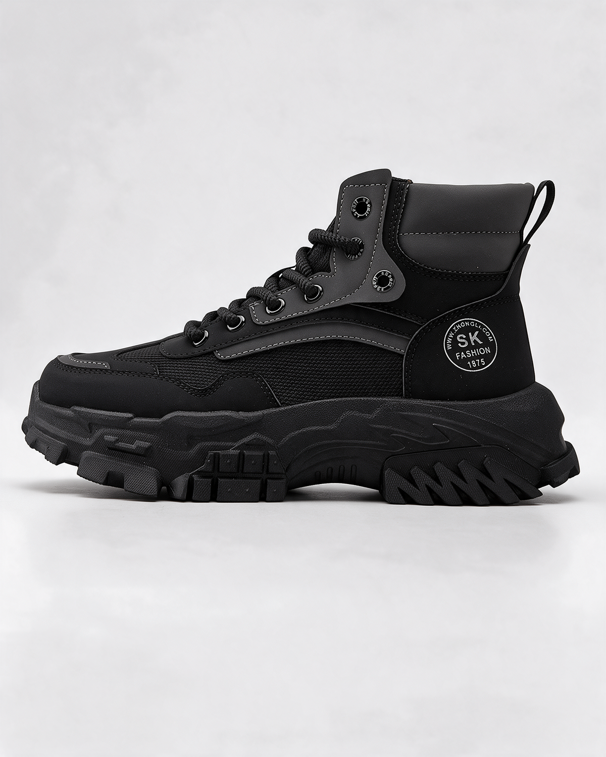 Black mesh-panel lace-up boot — side profile
