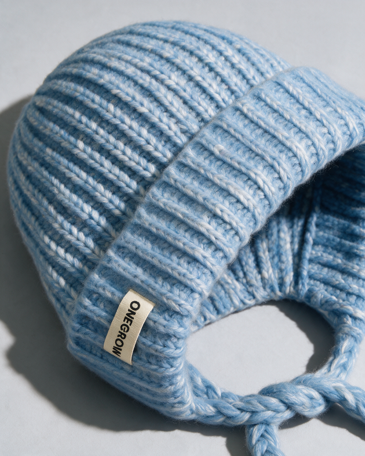 Women's knit earflap hat with braided ties — Blue, knit texture detail