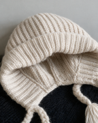 Women's knit earflap hat with braided ties — Off-White, knit texture detail