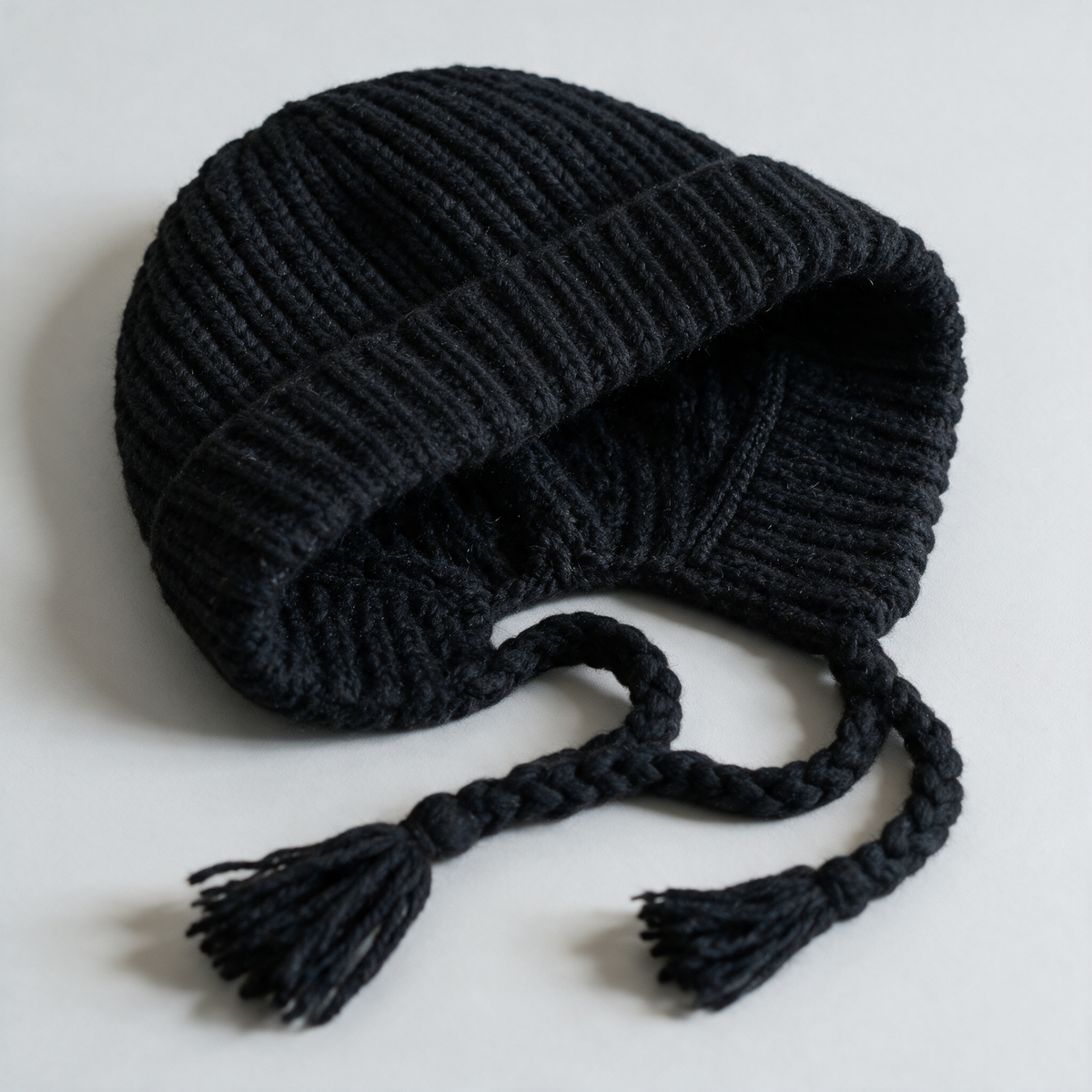 Knit earflap hat detail