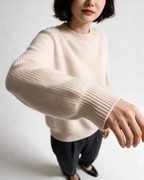 Beige knit garment — gallery-cuff