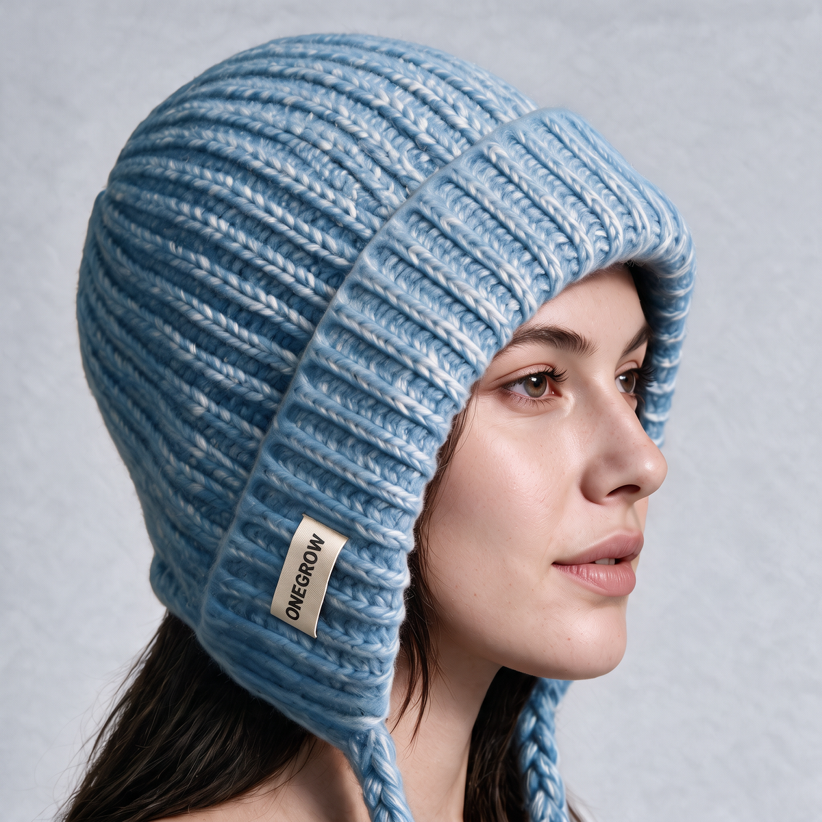 Blue earflap hat folded rim and label detail