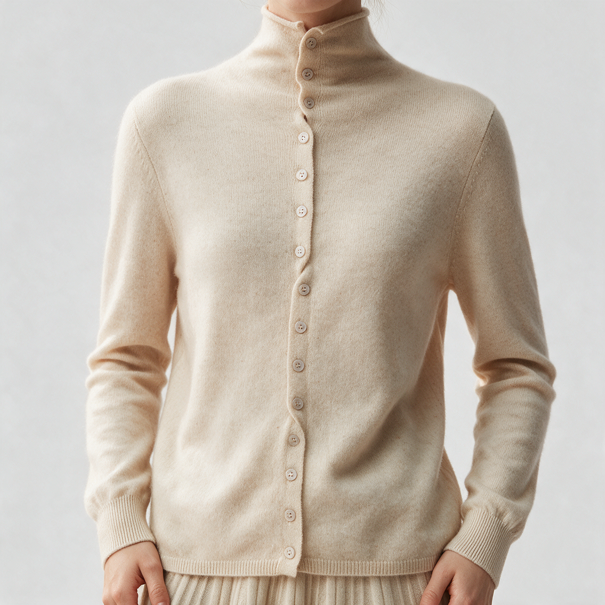 Cream button-front high-neck sweater feature1
