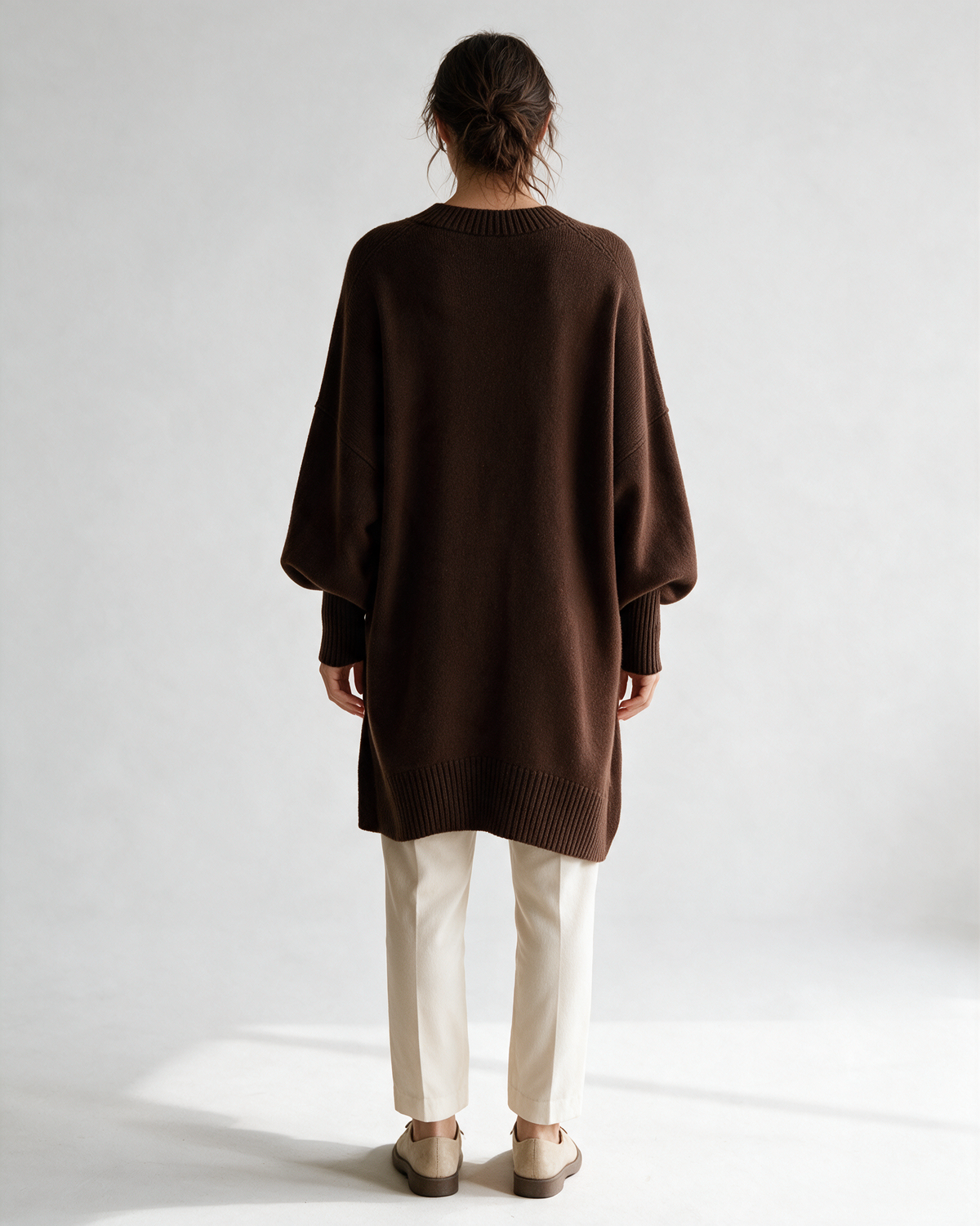 Brown oversized crewneck sweater detail