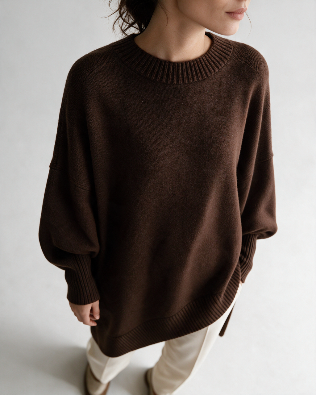 Brown oversized crewneck sweater detail