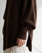 Brown oversized crewneck sweater detail